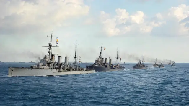 Reconstruction of a line of cruisers steaming in column through the Java Sea with shell splashes rising alongside the leading ship.