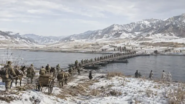 Reconstruction of a long military column crossing a pontoon bridge over a frozen river into snow-covered mountains.
