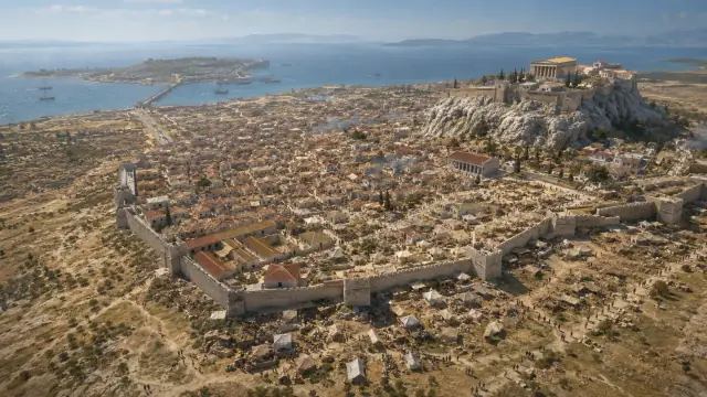 Aerial reconstruction of classical Athens inside its walls, dense housing packed between the Acropolis and the harbour road.